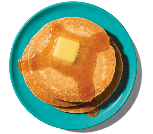 Eggo pancakes stacked on a plate